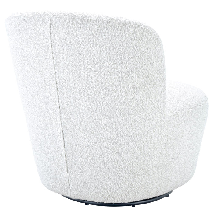 Loungestol i flot boucle. Loungestolen er creme farvet og har et helt roligt udtryk. Stolen kan dreje hele vejen rundt, hvilket gør den ideelt i flere rum. Stolen er også set hos Mathilde Gøhler og Masha Vang